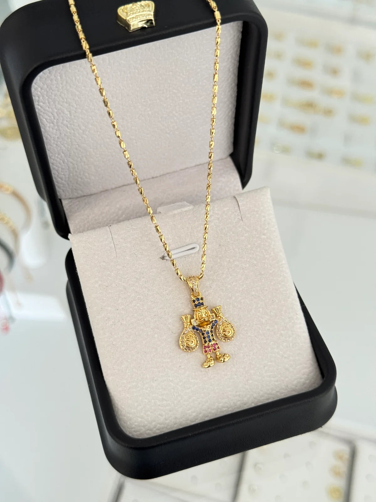 CADENA TUBE GOLD IT 65CMS + DIJE TÍO RICO PEQUEÑO