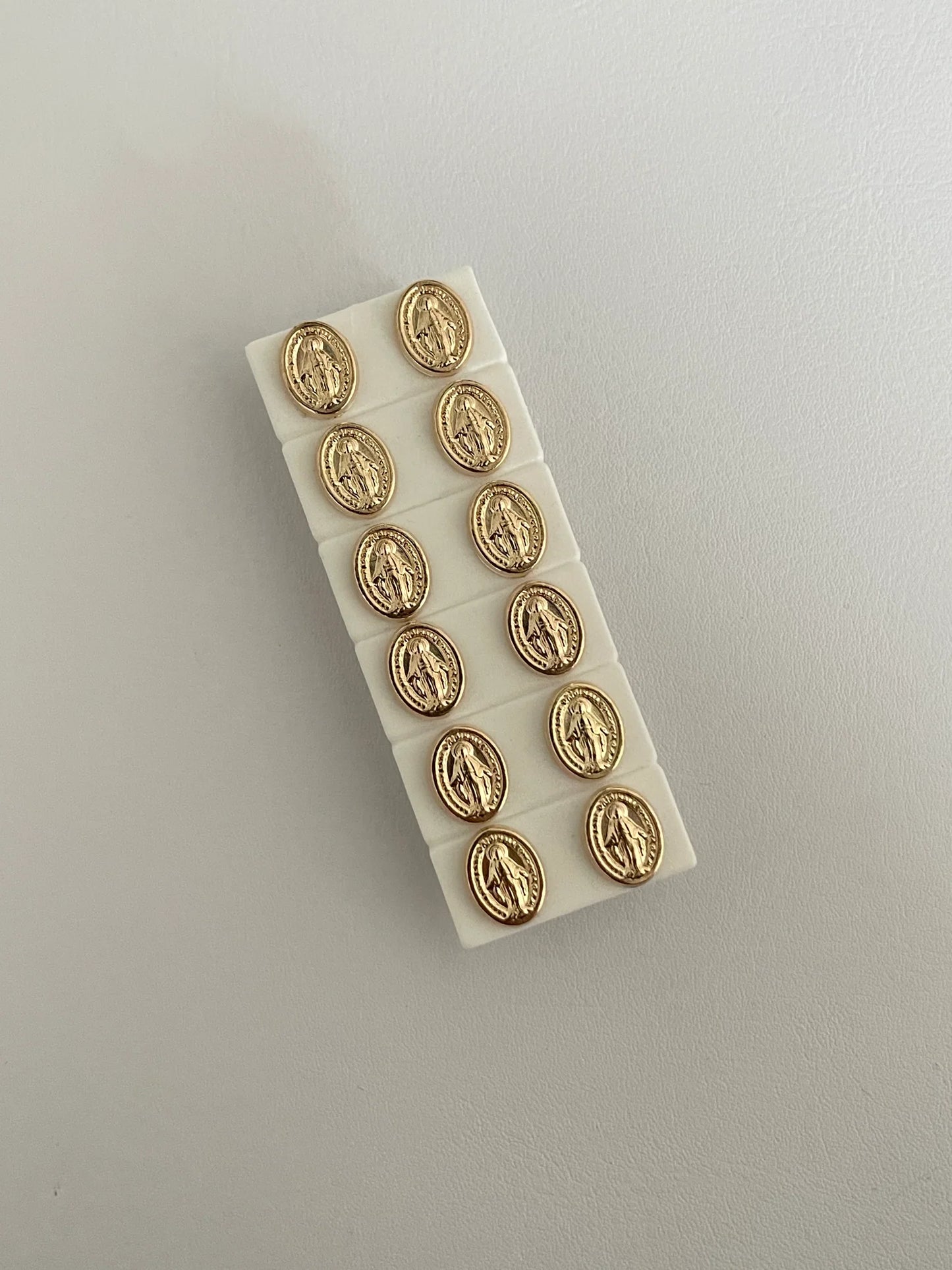 Topos Virgen Broche Seguridad